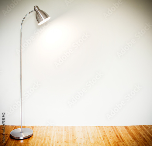 Empty room with modern floor lamp