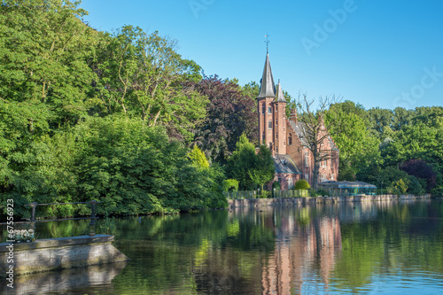 Bruges - Minnewater park in eveing light photo