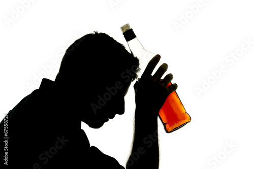 alcoholic man with whiskey bottle addiction problem silhouette