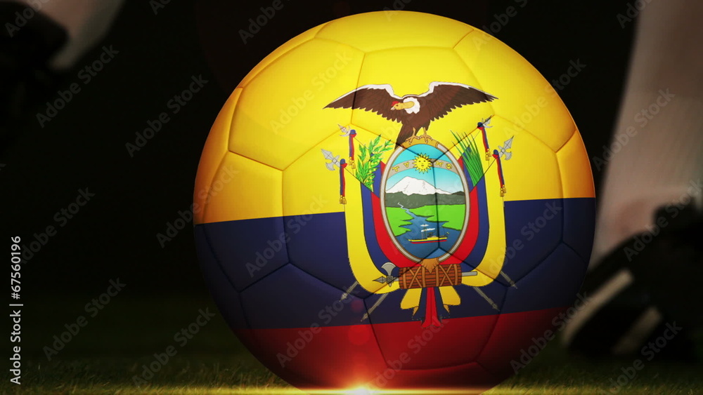 Football player kicking ecuador flag ball