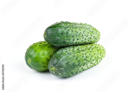 fresh three cucumbers isolated on white background