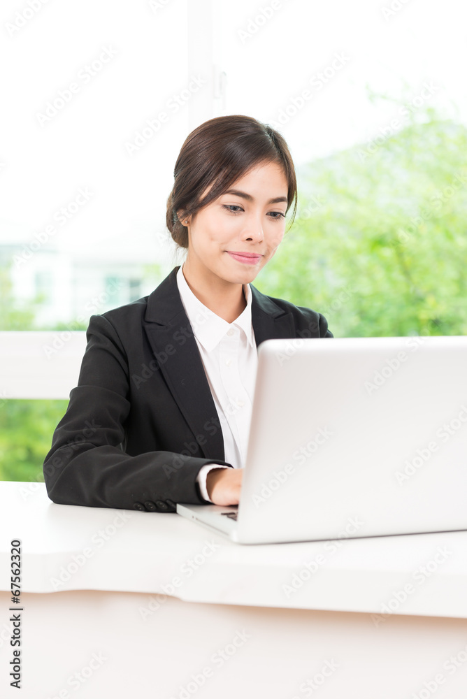 Business woman using computer laptop Business woman using computer laptop
