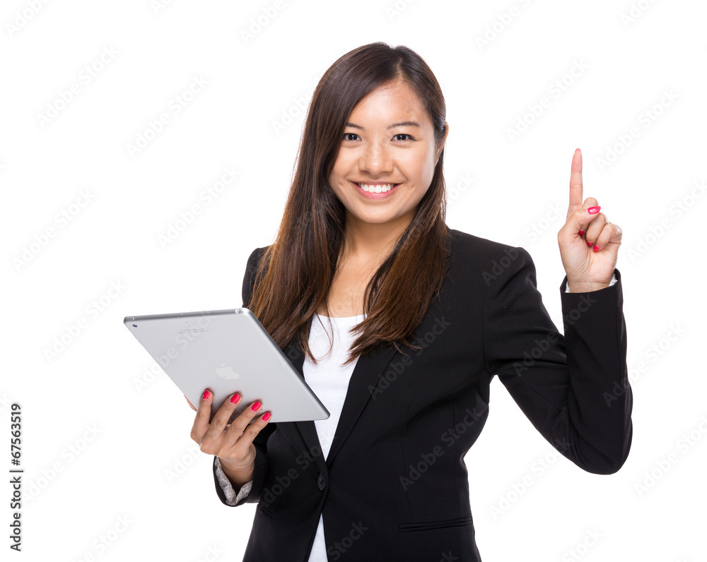 Asian business woman with digital tablet and finger up Asian business woman with digital tablet and finger up