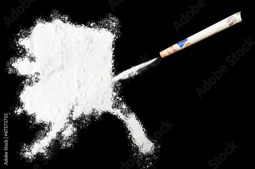 Powder drug like cocaine in the shape of Alaska.(series)