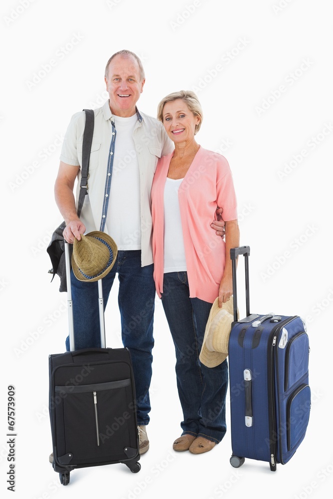 Smiling older couple going on their holidays Smiling older couple going on their holidays