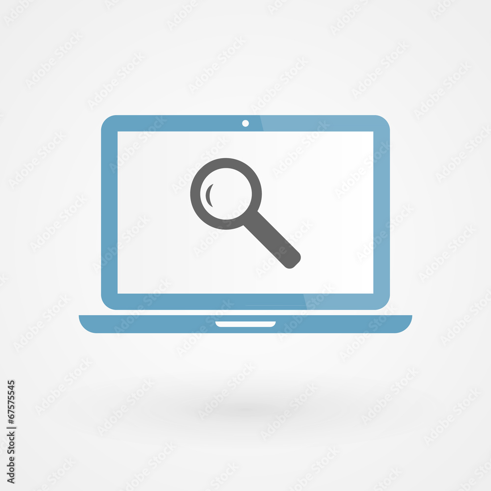 Laptop and magnifying glass Laptop and magnifying glass