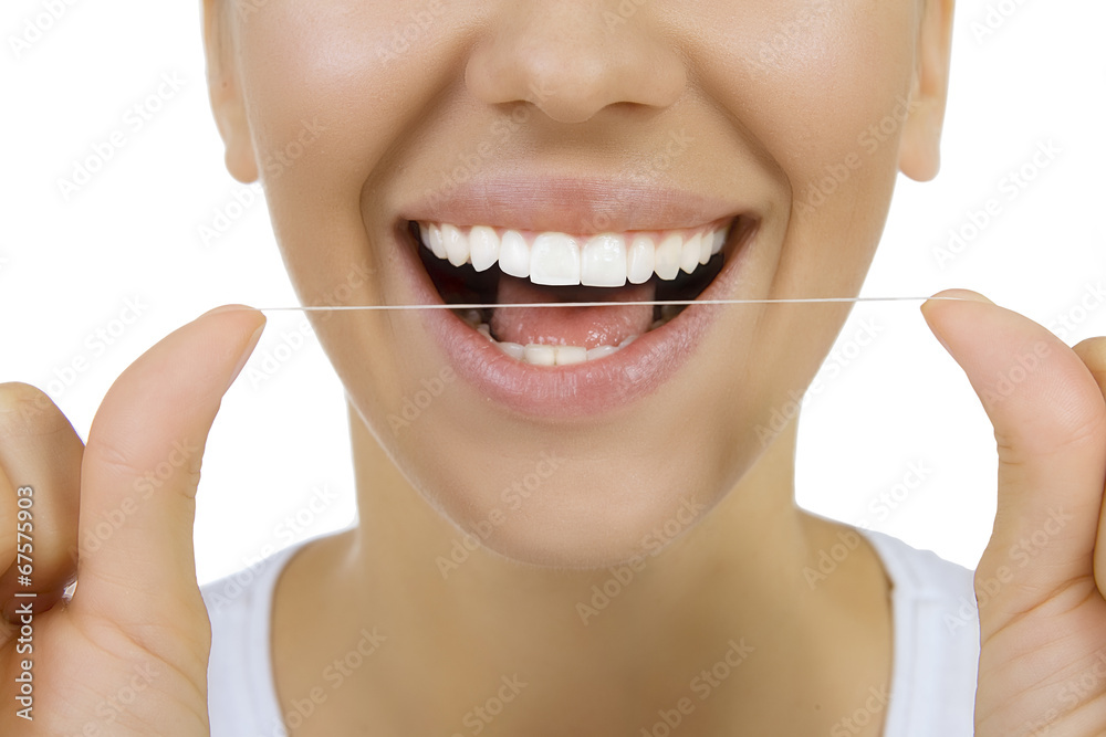 Woman and teeth floss Woman and teeth floss