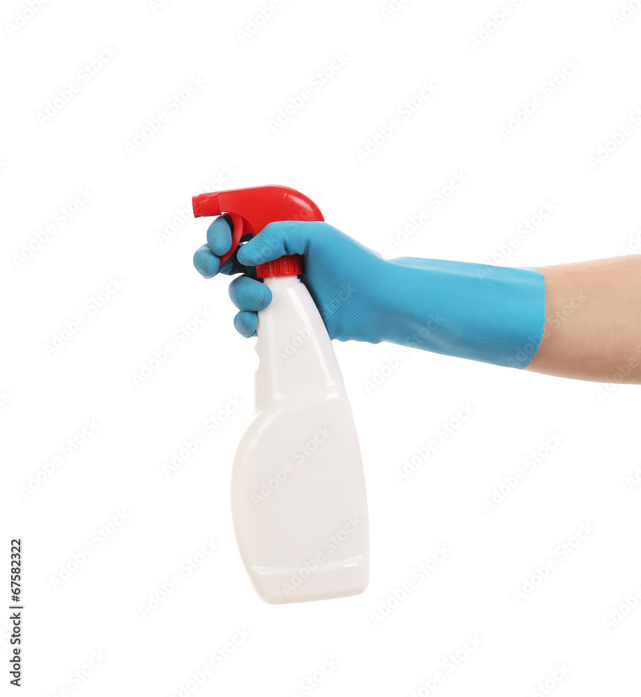 Hand in gloves holds spray bottle. Hand in gloves holds spray bottle.