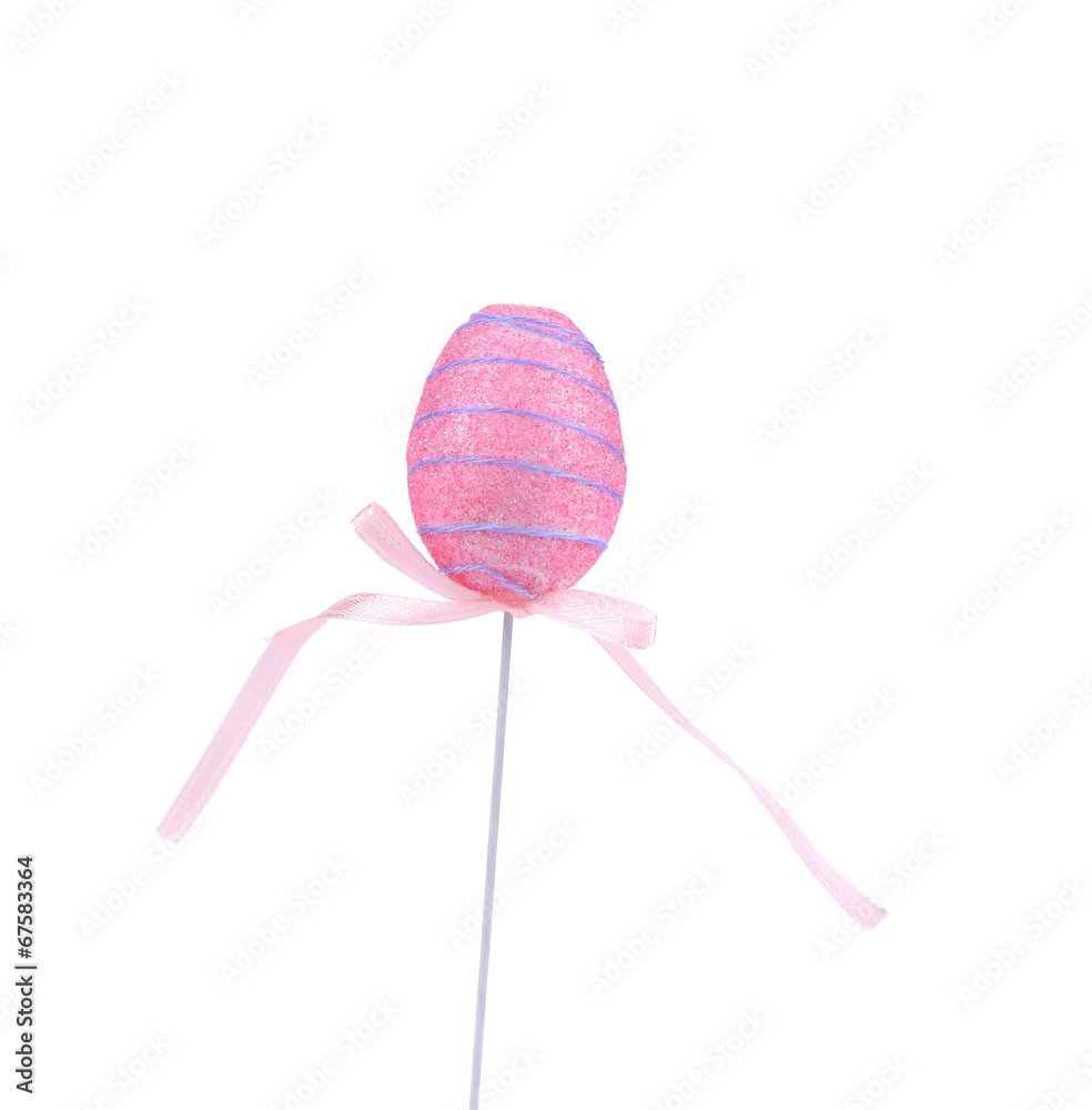 Pink easter egg on a stick.
