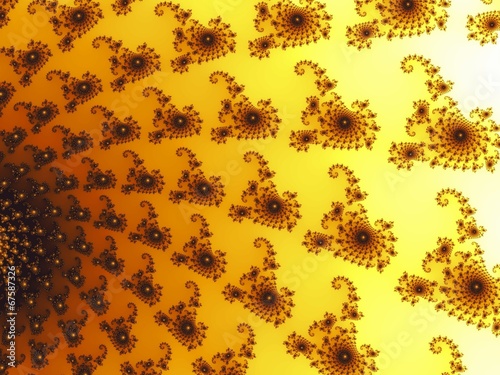 Decorative fractal background with spirals in a yellow colors
