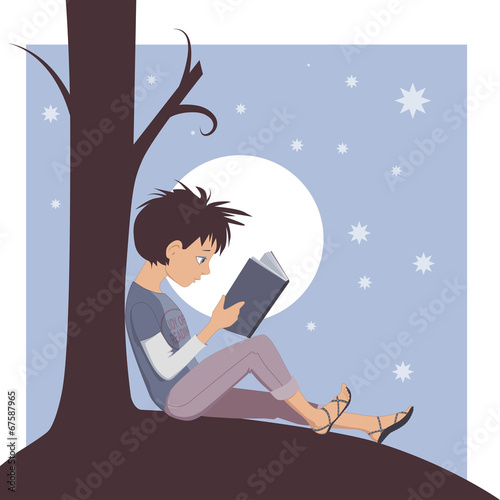 Little kid reading a book under a tree