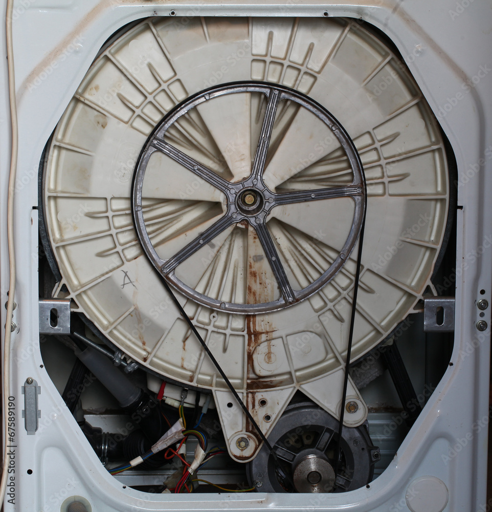 washing machine repair. spinning drum. internal mechanism