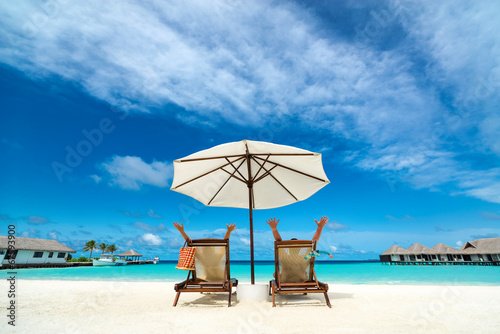 Couple on a tropical beach at Maldives