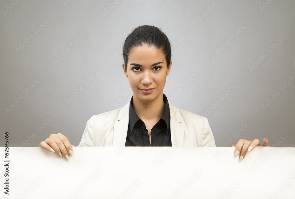 Young woman with blank board