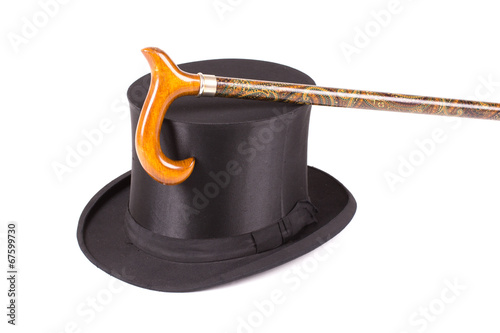 Fotografie Black silk hat and walking stick on white background