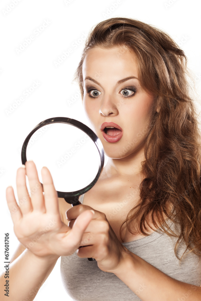 shocked young blonde looking her nails shocked young blonde looking her nails