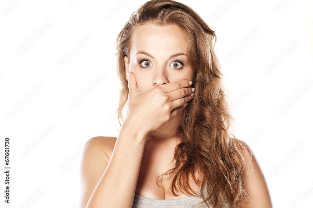 shocked young blonde on white background shocked young blonde on white background