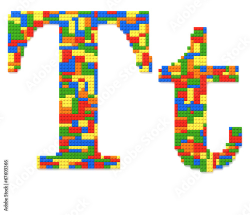 Letter T built from toy bricks in random colors