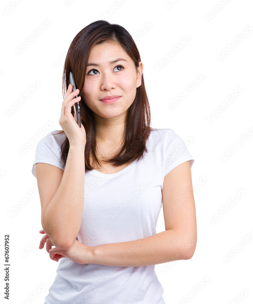 Asian woman talk to mobile phone Asian woman talk to mobile phone