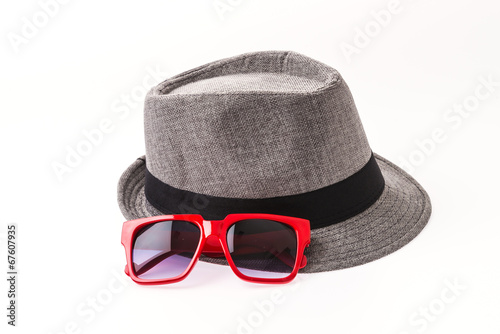 Hat   sunglasses isolated on white