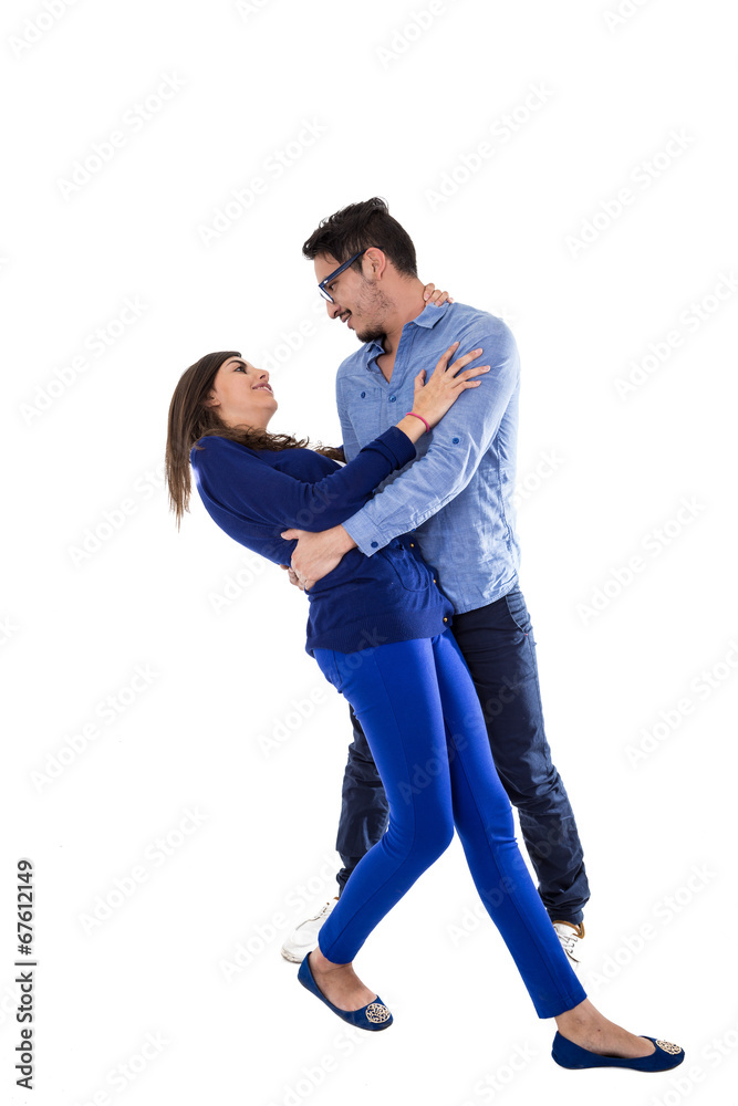 young attractive couple dressed in blue young attractive couple dressed in blue