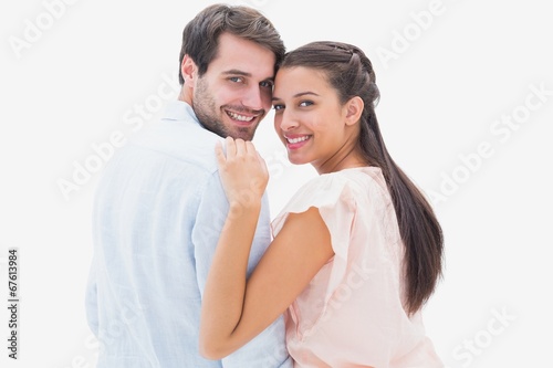 Attractive young couple smiling at camera