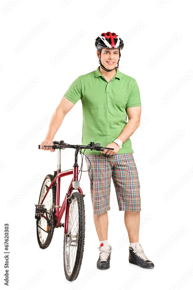 Man with a helmet pushing a bike Man with a helmet pushing a bike