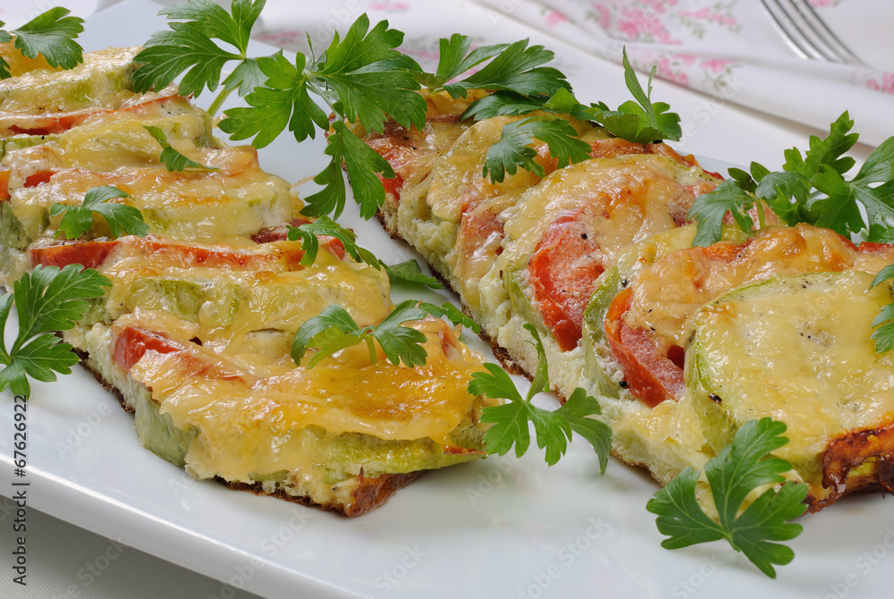 Baked zucchini with tomatoes and cheese Baked zucchini with tomatoes and cheese