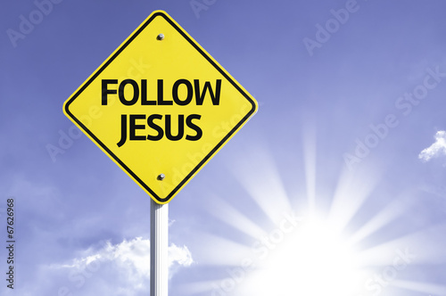 Follow Jesus road sign with sun background