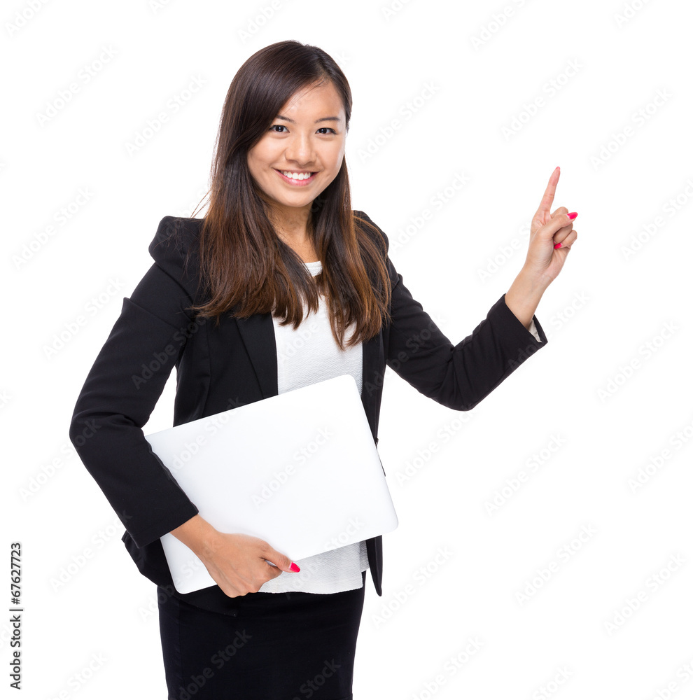 Asian business woman with laptop computer and finger point out Asian business woman with laptop computer and finger point out