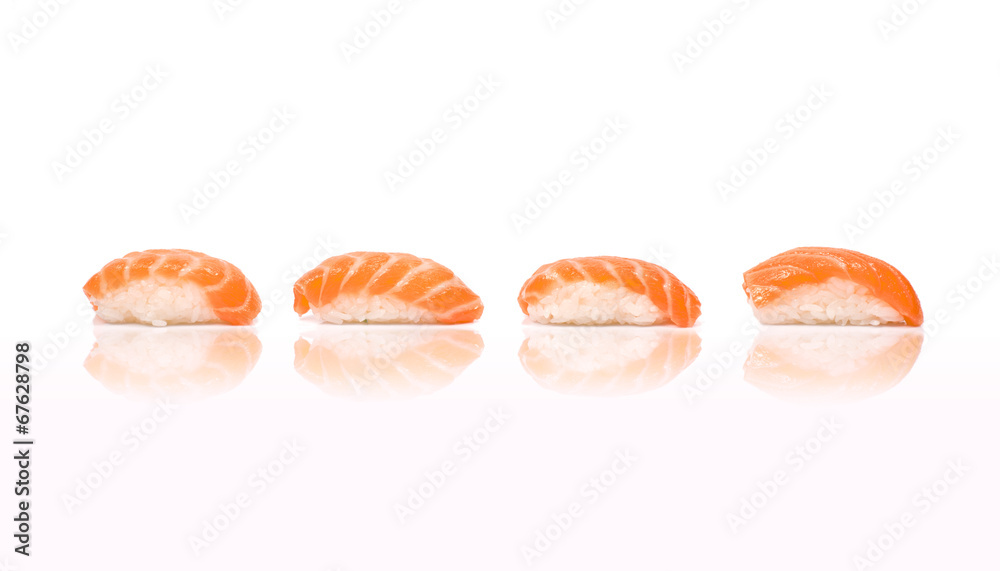 Four Sushi with Salmon in line with reflection isolated on white Four Sushi with Salmon in line with reflection isolated on white
