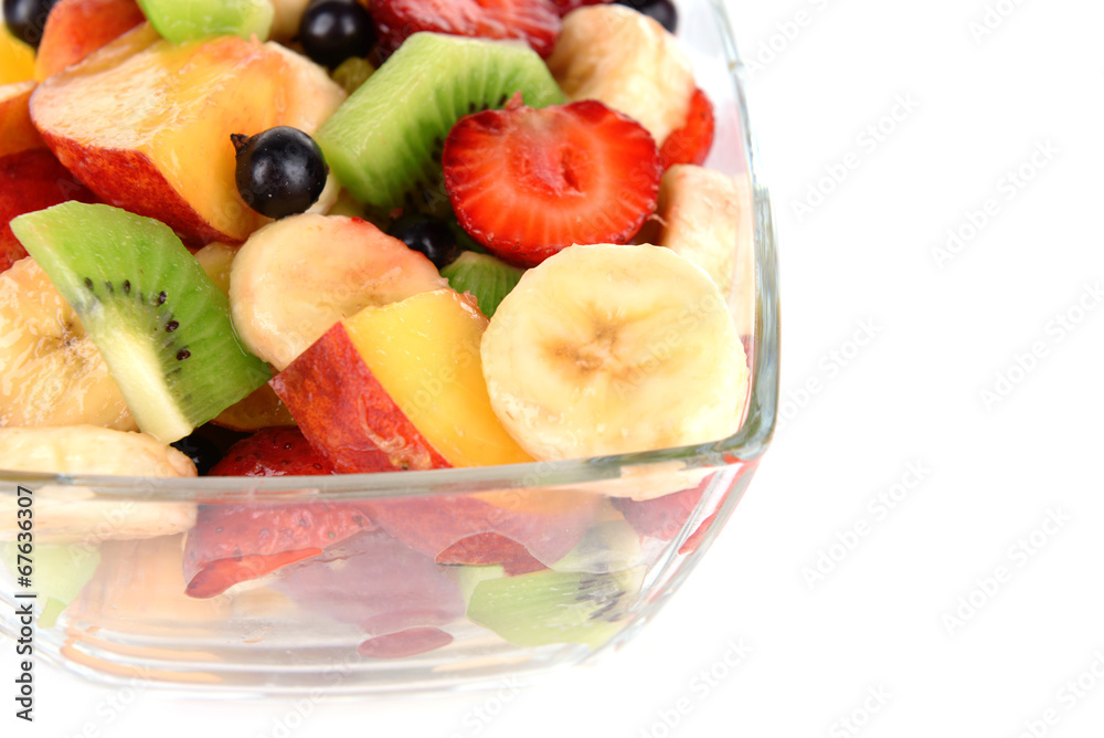 Fresh fruits salad in bowl isolated on white Fresh fruits salad in bowl isolated on white