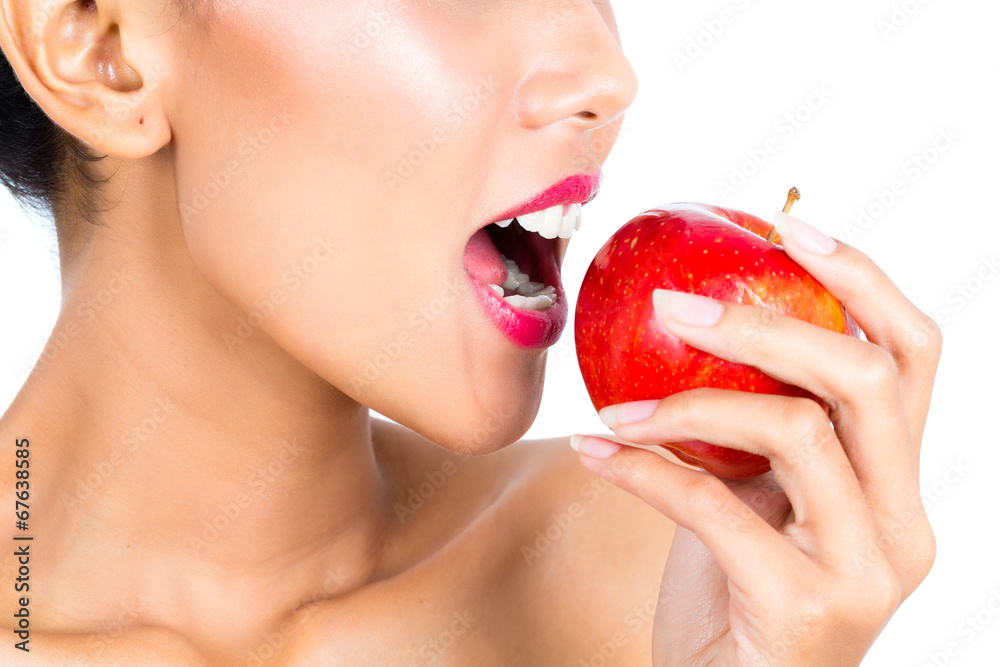 Asian woman eating apple and living healthy Asian woman eating apple and living healthy
