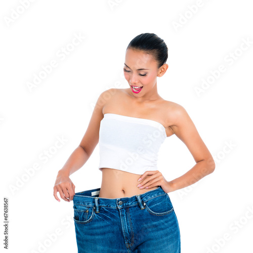 Young Asian woman losing weight by living healthy
