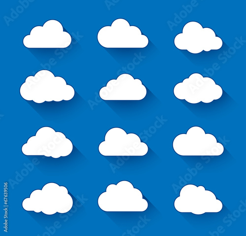 White clouds on blue sky with long shadow