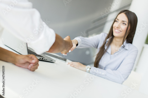 Business people shaking hands