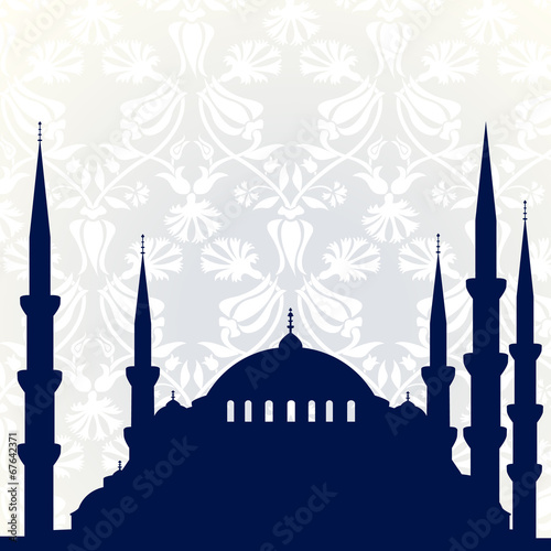 Ramadan Kareem greeting card, poster design with mosque on decorative floral background