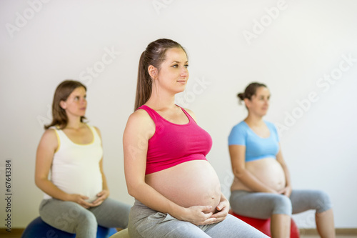 Pregnant women exercising