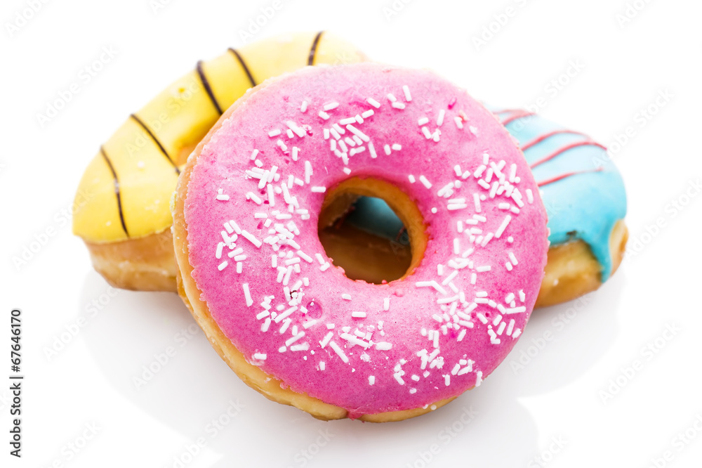 Three glazed donuts isolated on white background