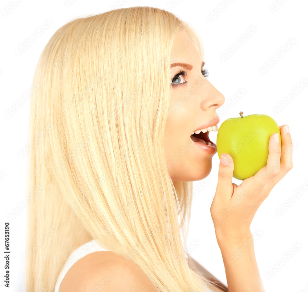 Young beautiful woman with apple isolated on white Young beautiful woman with apple isolated on white