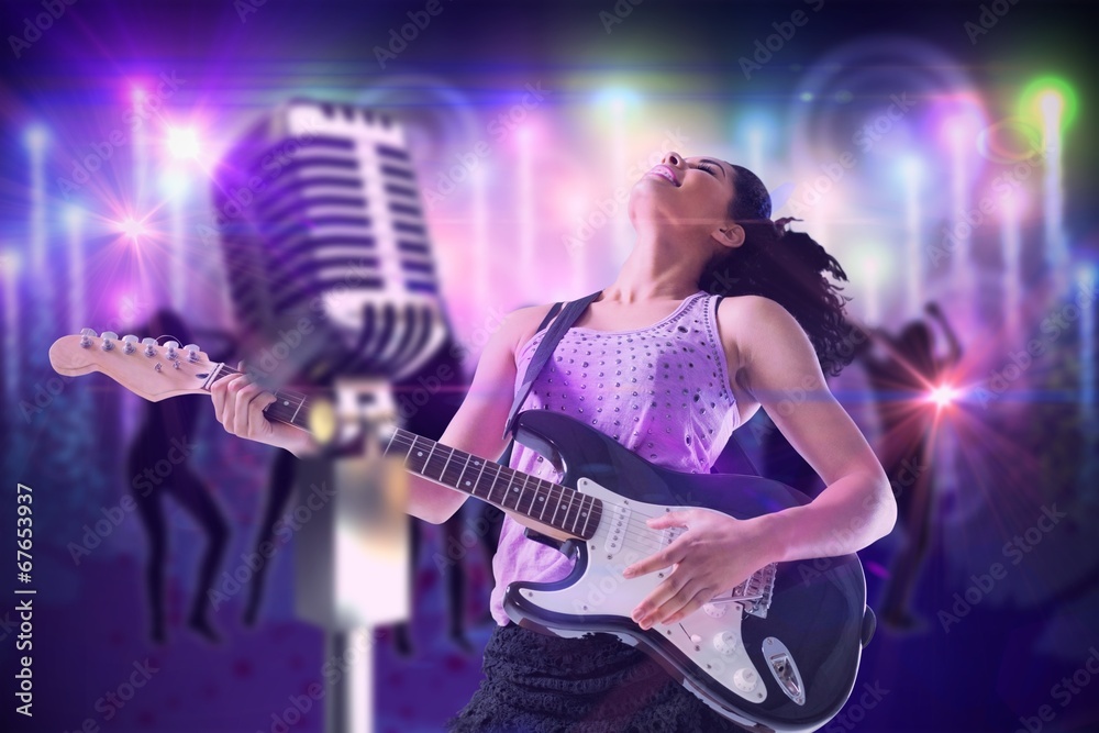 Fototapeta Composite image of pretty girl playing guitar