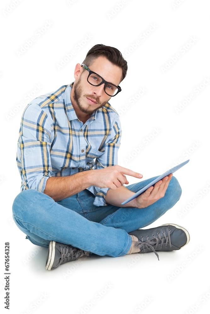 Handsome hipster using tablet pc Handsome hipster using tablet pc