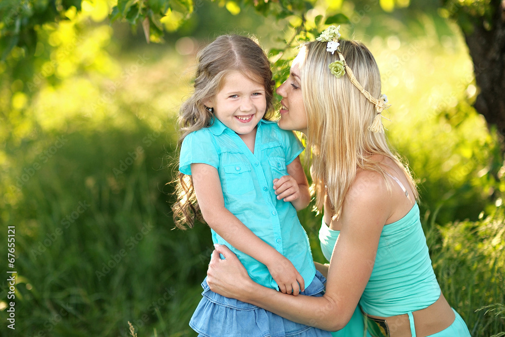 portrait of mother and daughter in nature portrait of mother and daughter in nature