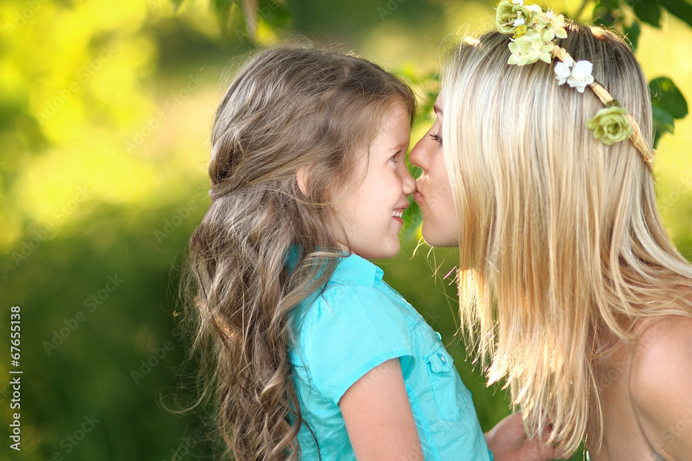 portrait of mother and daughter in nature portrait of mother and daughter in nature