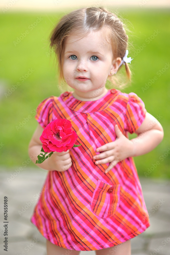 portrait of little girl outdoors in summer portrait of little girl outdoors in summer