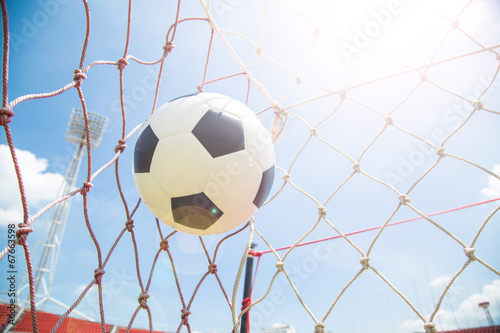 Soccer ball in the goal after shooted