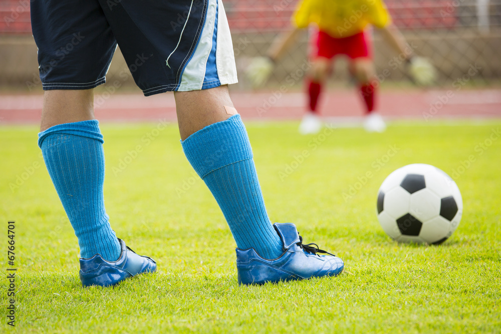Soccer player preparing free kick Soccer player preparing free kick