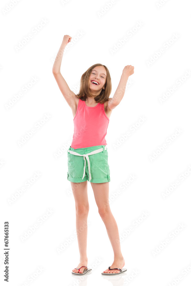 Laughing girl with arms raised Laughing girl with arms raised