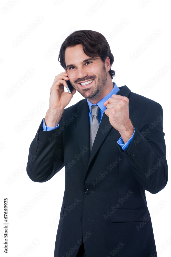 Stylish businessman talking on his mobile phone Stylish businessman talking on his mobile phone