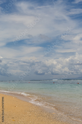 Beautiful tropical beach with lush vegetation